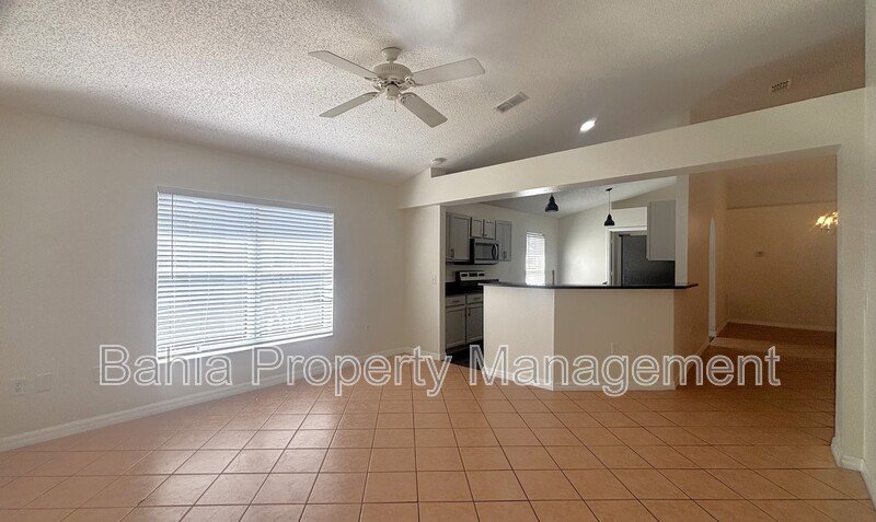 Inviting 4-bed/2-bath home in Wetherbee Lakes with no rear neighbors and a private backyard oasis! property image