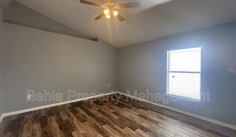 Inviting 4-bed/2-bath home in Wetherbee Lakes with no rear neighbors and a private backyard oasis! property image