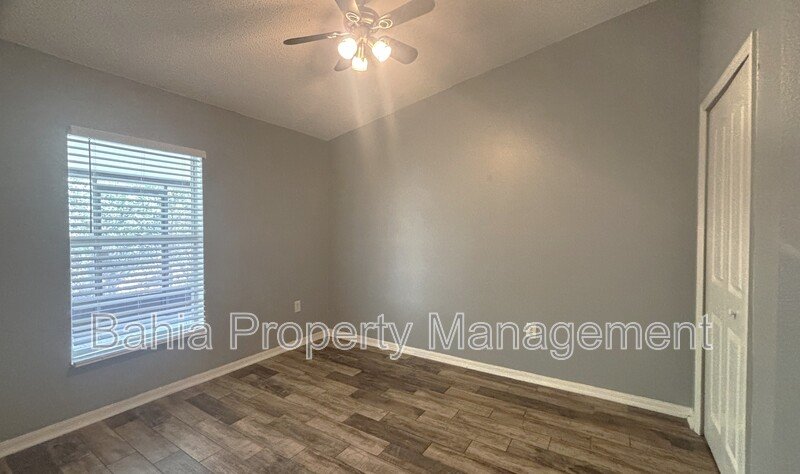 Inviting 4-bed/2-bath home in Wetherbee Lakes with no rear neighbors and a private backyard oasis! property image