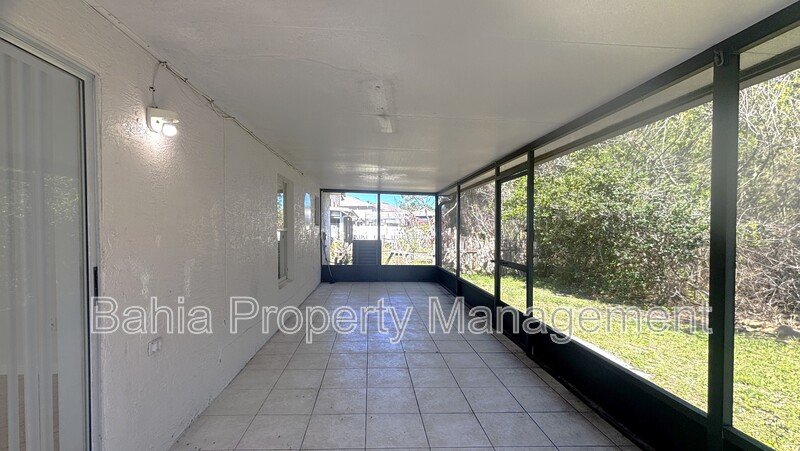 Inviting 4-bed/2-bath home in Wetherbee Lakes with no rear neighbors and a private backyard oasis! property image