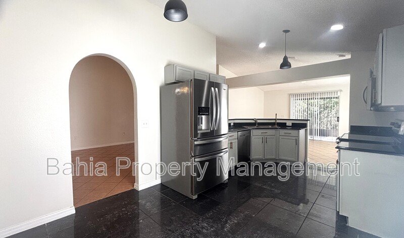 Inviting 4-bed/2-bath home in Wetherbee Lakes with no rear neighbors and a private backyard oasis! property image