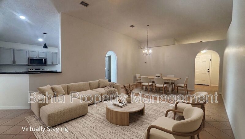 Inviting 4-bed/2-bath home in Wetherbee Lakes with no rear neighbors and a private backyard oasis! property image