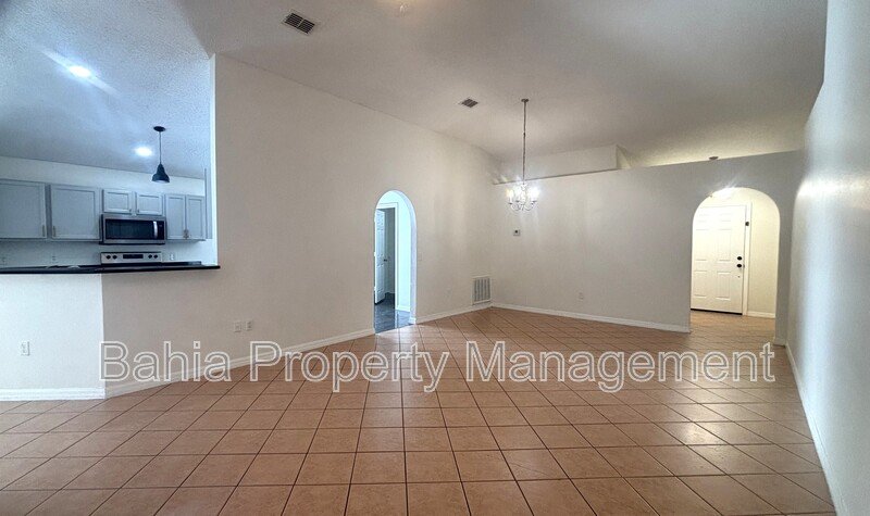 Inviting 4-bed/2-bath home in Wetherbee Lakes with no rear neighbors and a private backyard oasis! property image