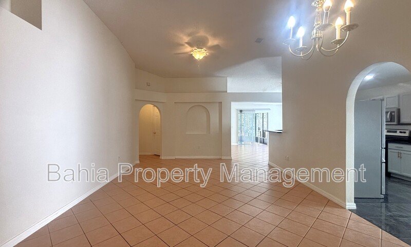 Inviting 4-bed/2-bath home in Wetherbee Lakes with no rear neighbors and a private backyard oasis! property image