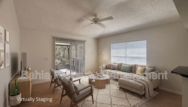 Inviting 4-bed/2-bath home in Wetherbee Lakes with no rear neighbors and a private backyard oasis! property image