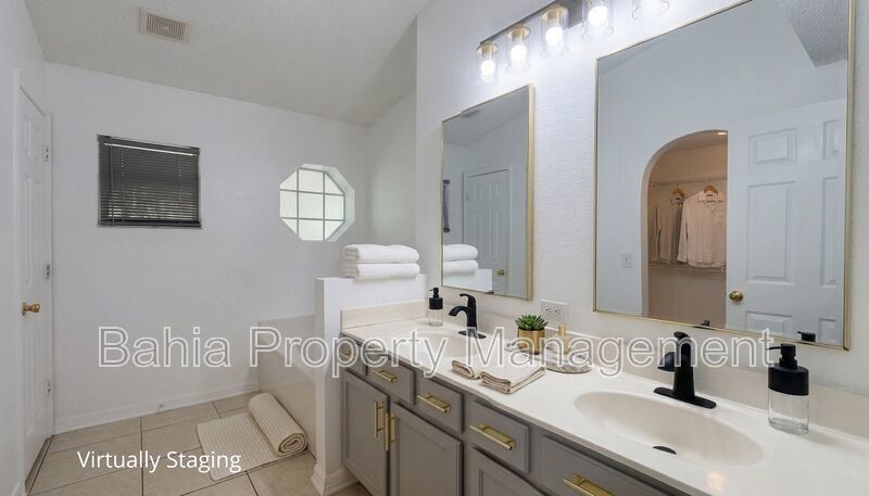 Inviting 4-bed/2-bath home in Wetherbee Lakes with no rear neighbors and a private backyard oasis! property image