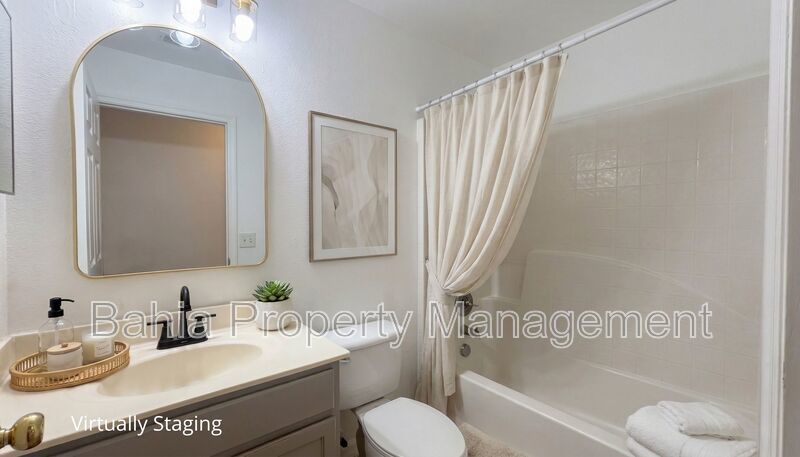 Inviting 4-bed/2-bath home in Wetherbee Lakes with no rear neighbors and a private backyard oasis! property image