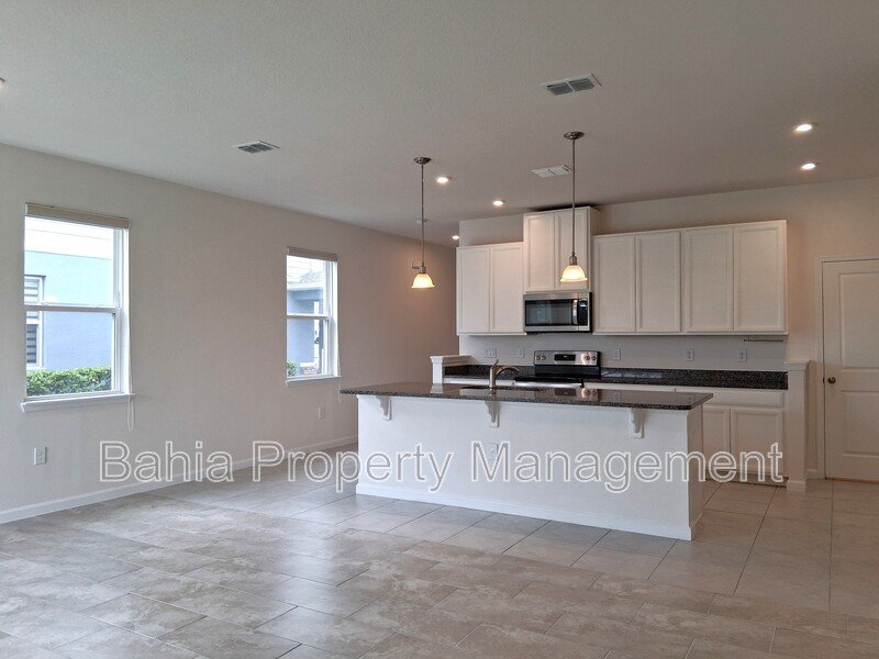 Elegant 3-Bed, 2.5-Bath Corner Unit with 2-Car Garage, Patio Views & Resort-Style amenities property image