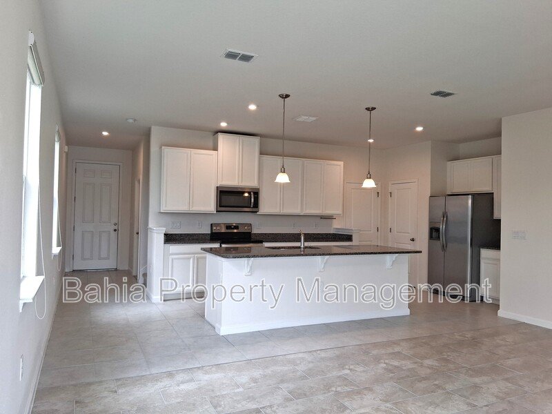 Elegant 3-Bed, 2.5-Bath Corner Unit with 2-Car Garage, Patio Views & Resort-Style amenities property image