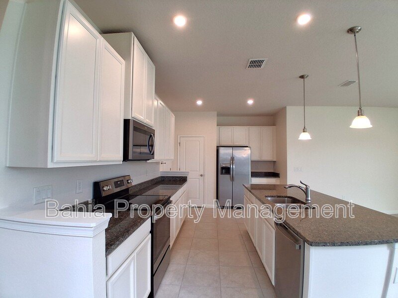 Elegant 3-Bed, 2.5-Bath Corner Unit with 2-Car Garage, Patio Views & Resort-Style amenities property image