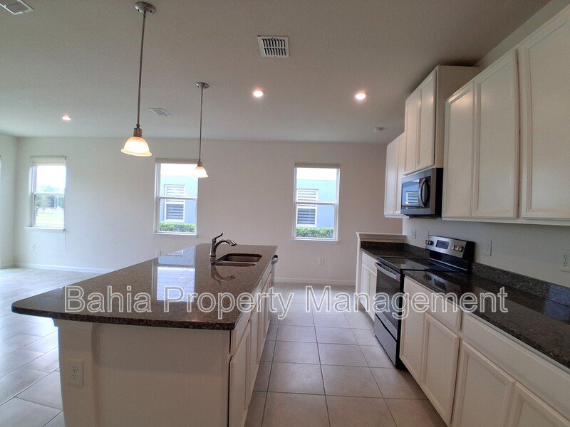 Elegant 3-Bed, 2.5-Bath Corner Unit with 2-Car Garage, Patio Views & Resort-Style amenities property image