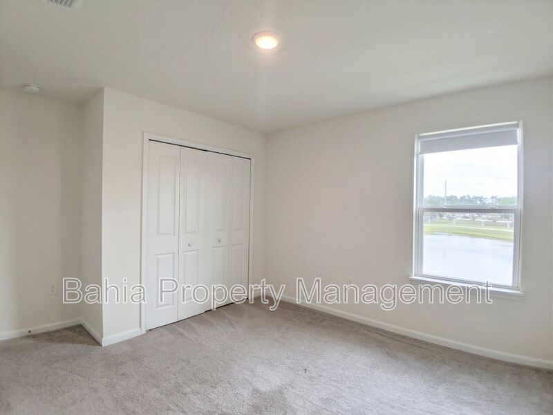 Elegant 3-Bed, 2.5-Bath Corner Unit with 2-Car Garage, Patio Views & Resort-Style amenities property image