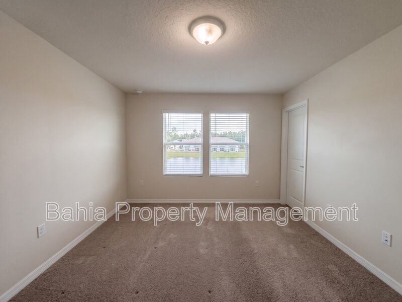 Modern 3 Bed / 2.5 Bath Townhome with Smart Tech, Pond View & Resort Amenities! property image