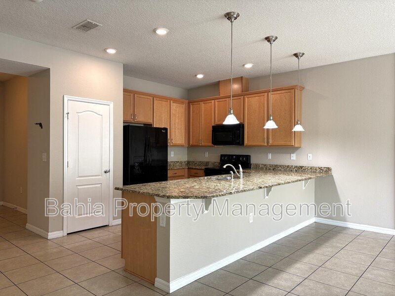 Luxury 4 Bed | 3.5 Bath Townhome in Resort-Style Gated Community. Prime Location Near Disney! property image