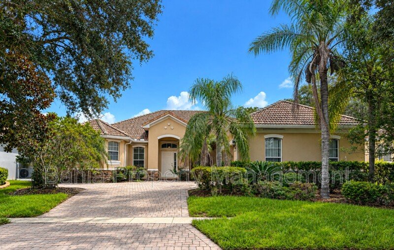Resort-Style Living! Gorgeous 4 Bed/3 Bath Bellalago Home with 3-Car Garage. No Rear Neighbors! property image