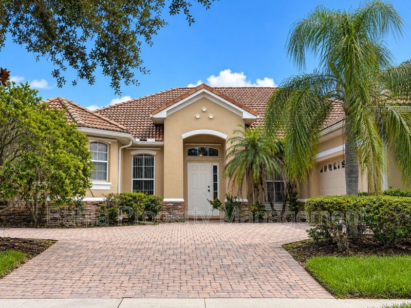 Resort-Style Living! Gorgeous 4 Bed/3 Bath Bellalago Home with 3-Car Garage. No Rear Neighbors! property image