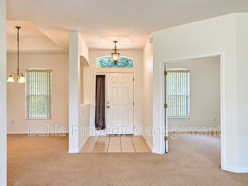 Resort-Style Living! Gorgeous 4 Bed/3 Bath Bellalago Home with 3-Car Garage. No Rear Neighbors! property image