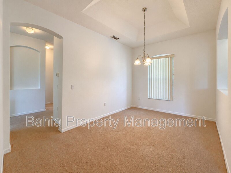 Resort-Style Living! Gorgeous 4 Bed/3 Bath Bellalago Home with 3-Car Garage. No Rear Neighbors! property image