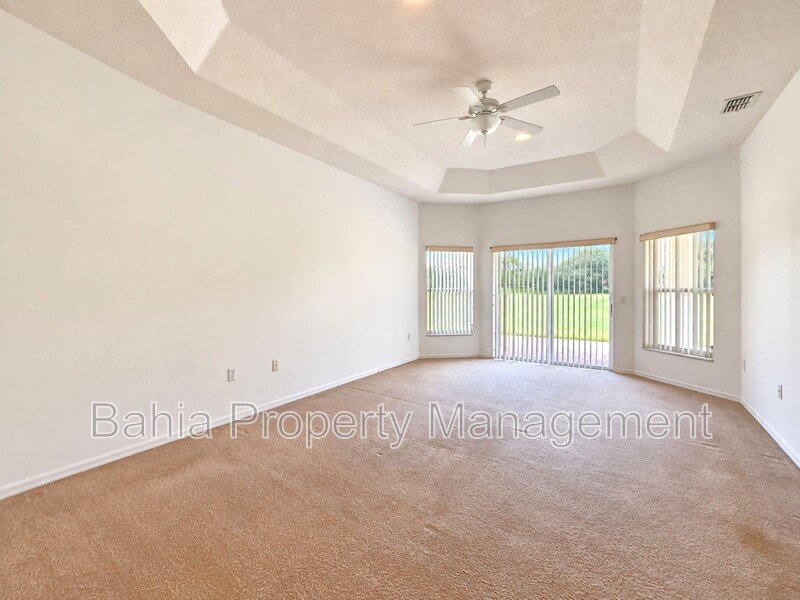Resort-Style Living! Gorgeous 4 Bed/3 Bath Bellalago Home with 3-Car Garage. No Rear Neighbors! property image