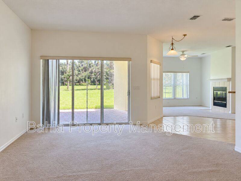 Resort-Style Living! Gorgeous 4 Bed/3 Bath Bellalago Home with 3-Car Garage. No Rear Neighbors! property image