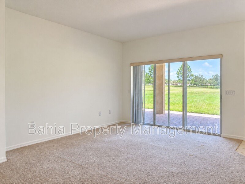 Resort-Style Living! Gorgeous 4 Bed/3 Bath Bellalago Home with 3-Car Garage. No Rear Neighbors! property image