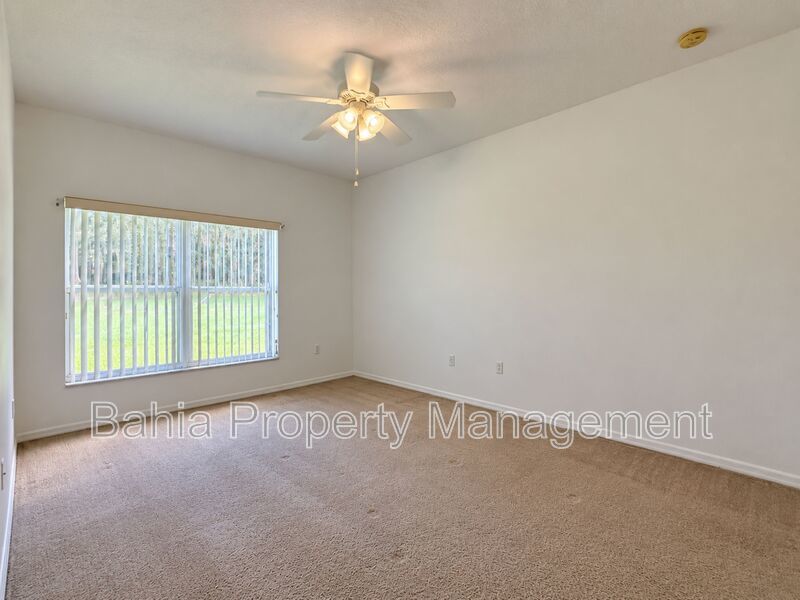 Resort-Style Living! Gorgeous 4 Bed/3 Bath Bellalago Home with 3-Car Garage. No Rear Neighbors! property image