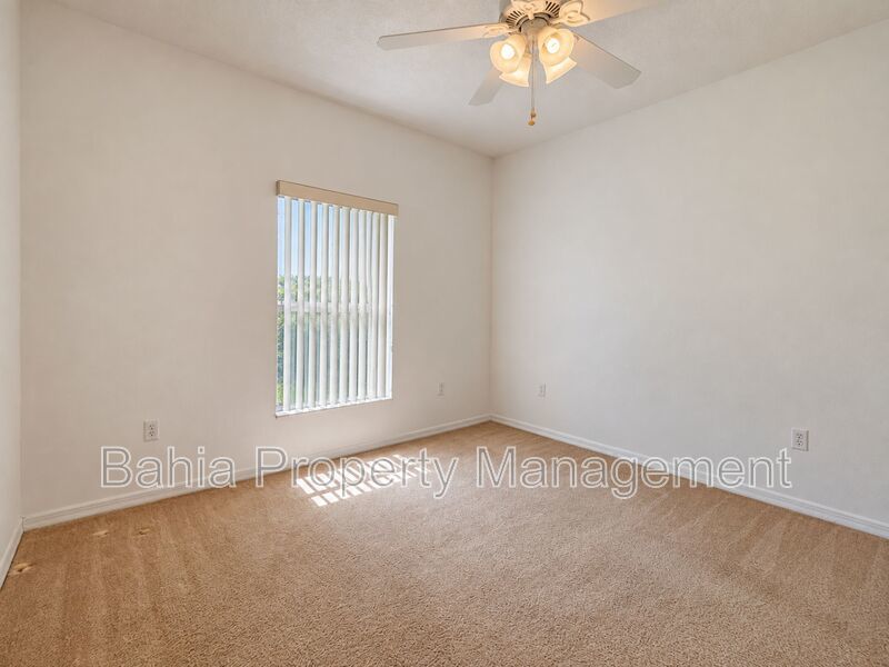 Resort-Style Living! Gorgeous 4 Bed/3 Bath Bellalago Home with 3-Car Garage. No Rear Neighbors! property image