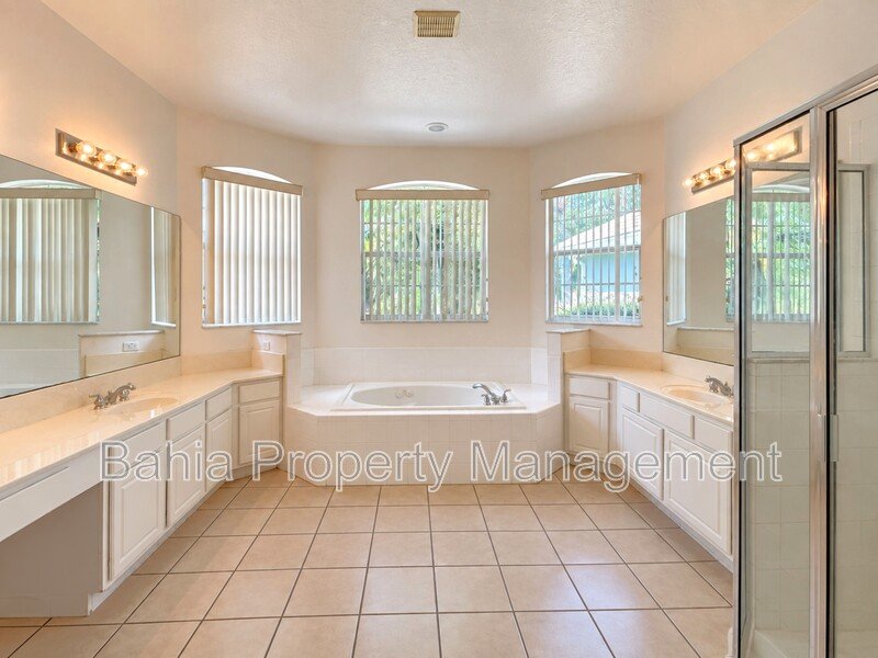 Resort-Style Living! Gorgeous 4 Bed/3 Bath Bellalago Home with 3-Car Garage. No Rear Neighbors! property image