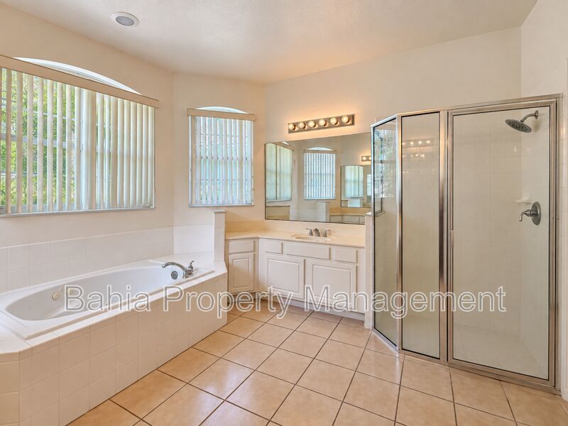 Resort-Style Living! Gorgeous 4 Bed/3 Bath Bellalago Home with 3-Car Garage. No Rear Neighbors! property image