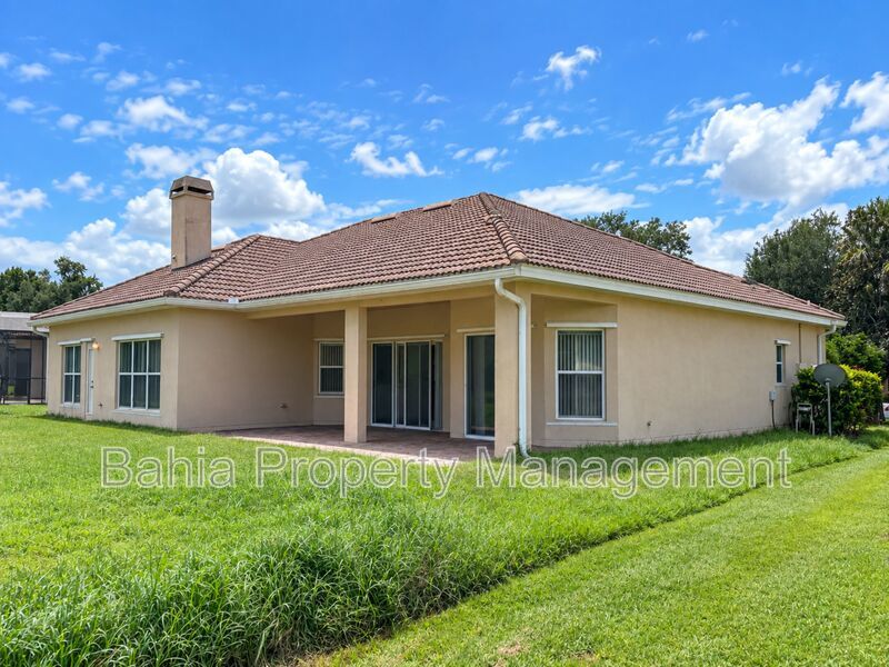 Resort-Style Living! Gorgeous 4 Bed/3 Bath Bellalago Home with 3-Car Garage. No Rear Neighbors! property image