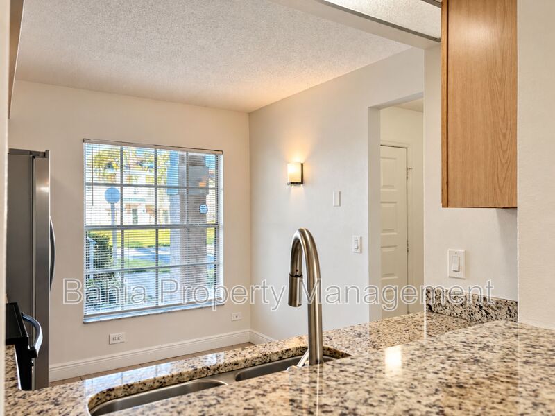 Renovated 2BD/2BA Gated Condo w/ Granite Countertops, New AC & Screened Lanai | Prime Location property image