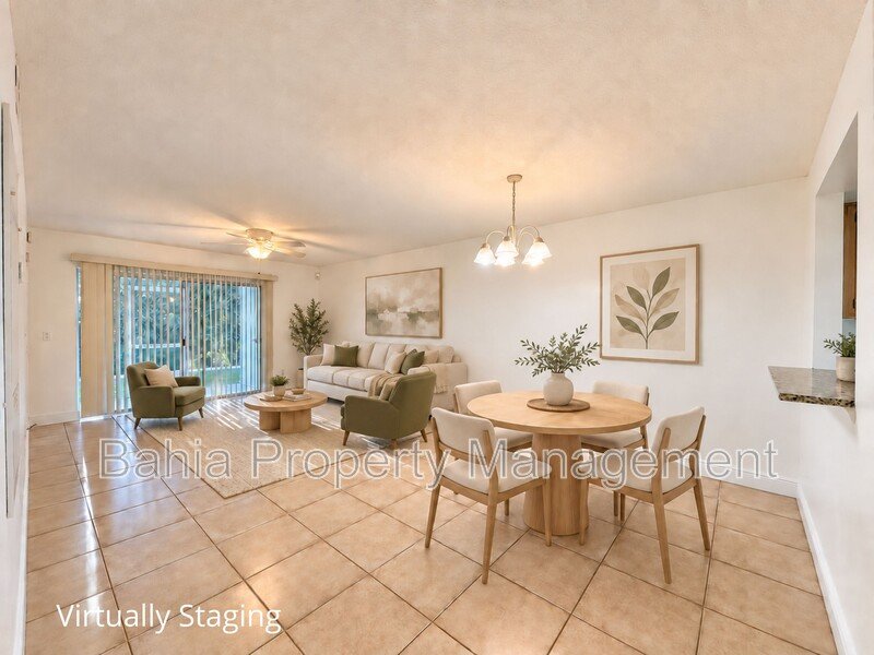 Renovated 2BD/2BA Gated Condo w/ Granite Countertops, New AC & Screened Lanai | Prime Location property image