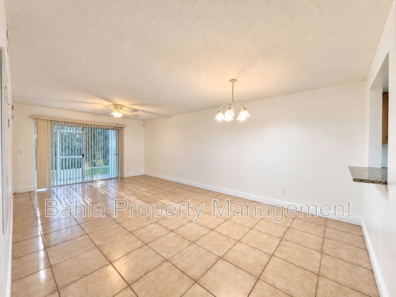 Renovated 2BD/2BA Gated Condo w/ Granite Countertops, New AC & Screened Lanai | Prime Location property image