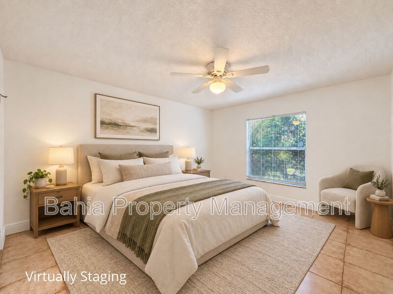 Renovated 2BD/2BA Gated Condo w/ Granite Countertops, New AC & Screened Lanai | Prime Location property image