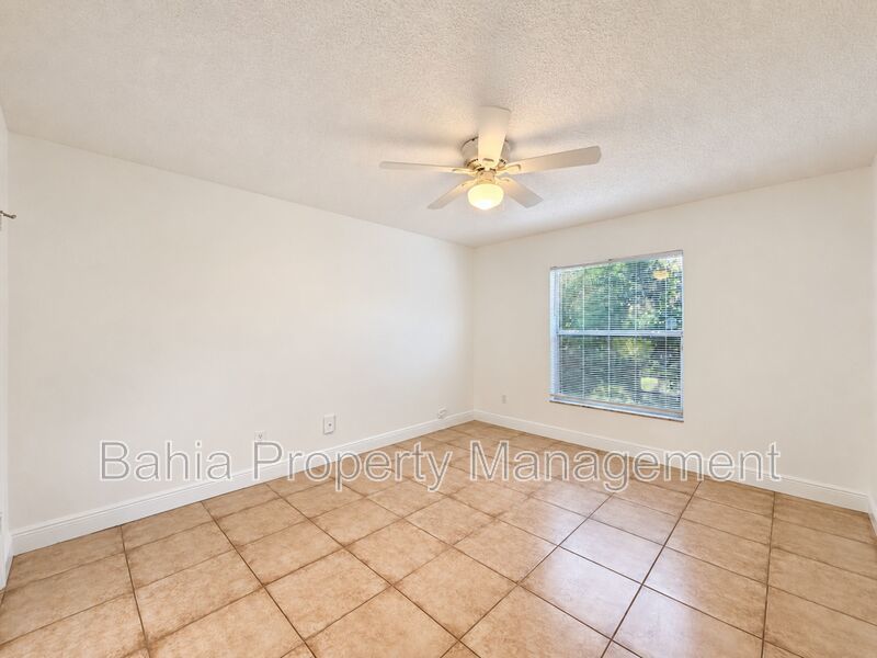 Renovated 2BD/2BA Gated Condo w/ Granite Countertops, New AC & Screened Lanai | Prime Location property image