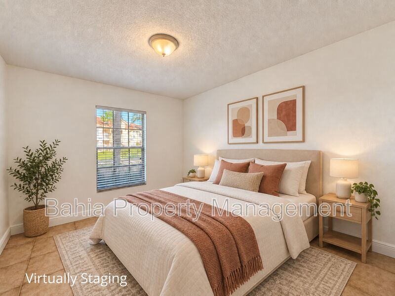 Renovated 2BD/2BA Gated Condo w/ Granite Countertops, New AC & Screened Lanai | Prime Location property image