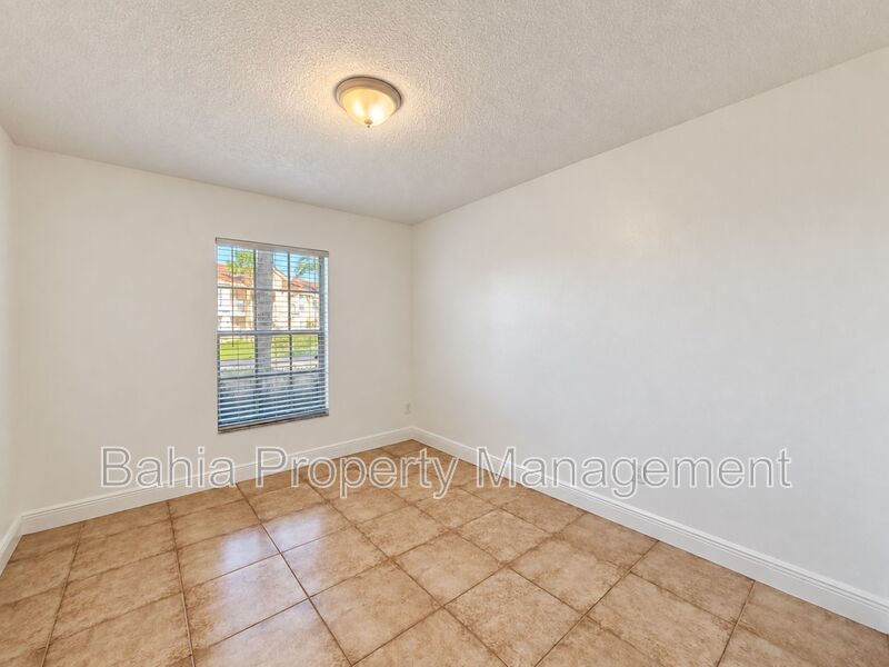 Renovated 2BD/2BA Gated Condo w/ Granite Countertops, New AC & Screened Lanai | Prime Location property image