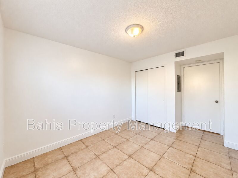 Renovated 2BD/2BA Gated Condo w/ Granite Countertops, New AC & Screened Lanai | Prime Location property image
