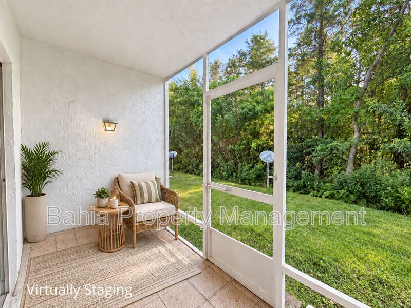 Renovated 2BD/2BA Gated Condo w/ Granite Countertops, New AC & Screened Lanai | Prime Location property image